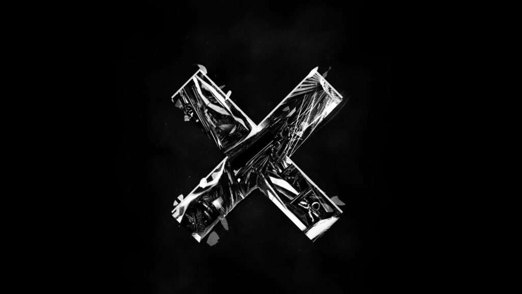Stunning 2560x1440 Metallic Cross Wallpaper on Black Background