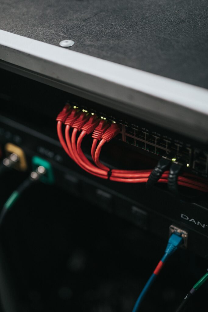 High-Res Wallpaper: Red Ethernet Cables & Organized Network Setup