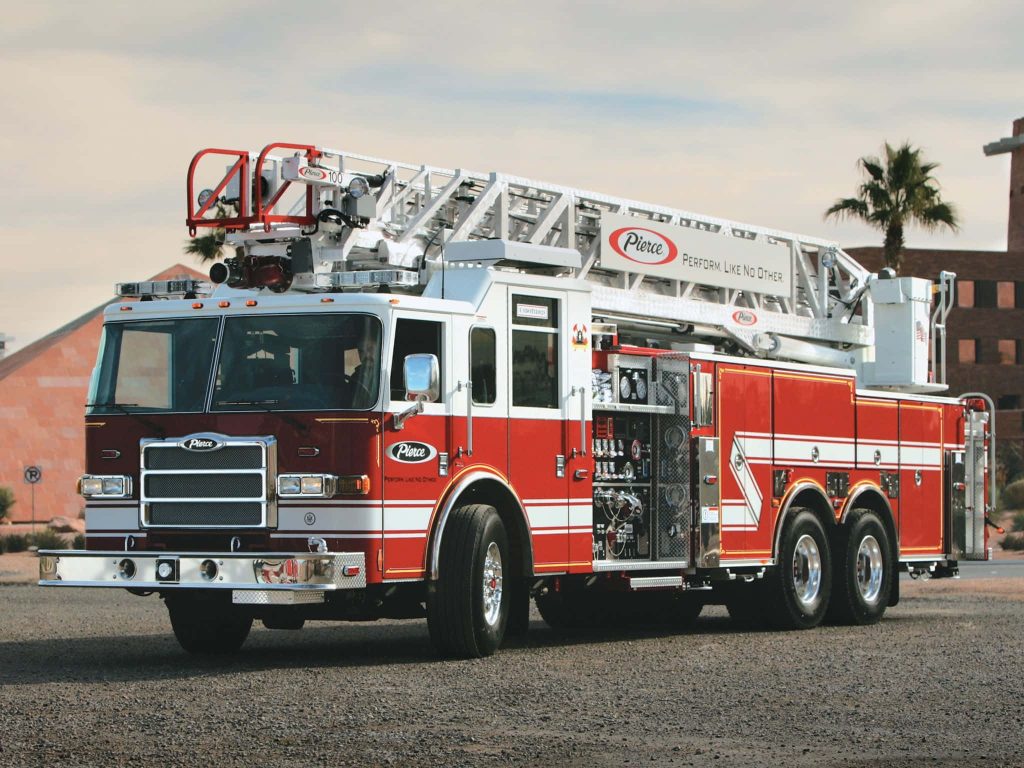 High-resolution red and white Pierce aerial ladder fire truck ready for city emergency response outdoors Wallpaper