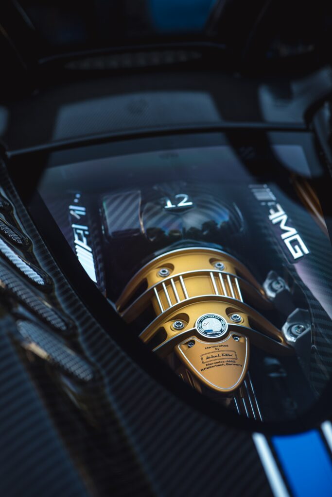 Close-Up Sportscar Engine Wallpaper: Precision & Futuristic Design