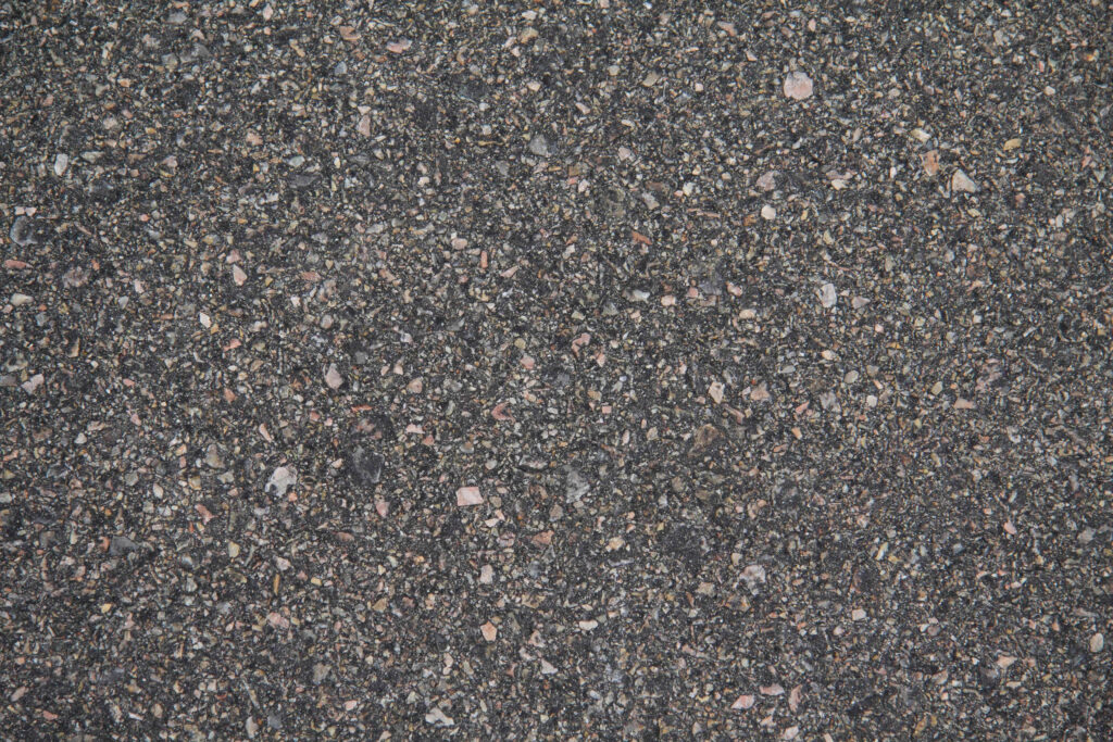 High-Res Teer Road Wallpaper: Textured Asphalt for Design Projects