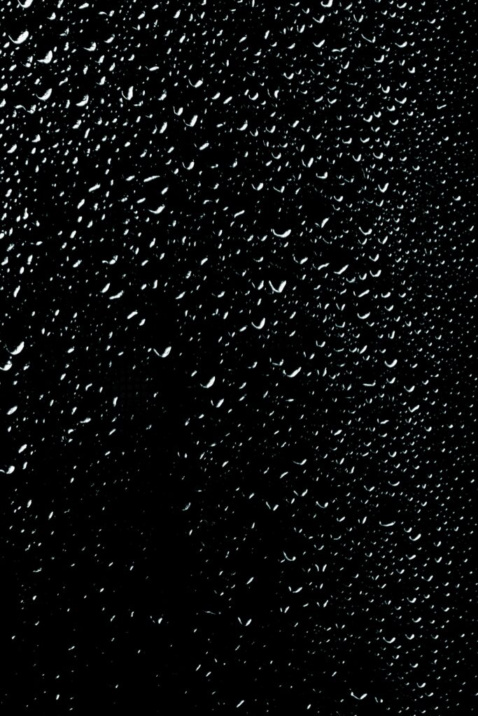 High-Res Wallpaper: Water Droplets on Dark Surface Background
