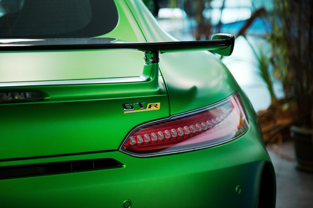 Stunning Green Sports Car Wallpaper: Modern Design & Dynamic Aesthetic