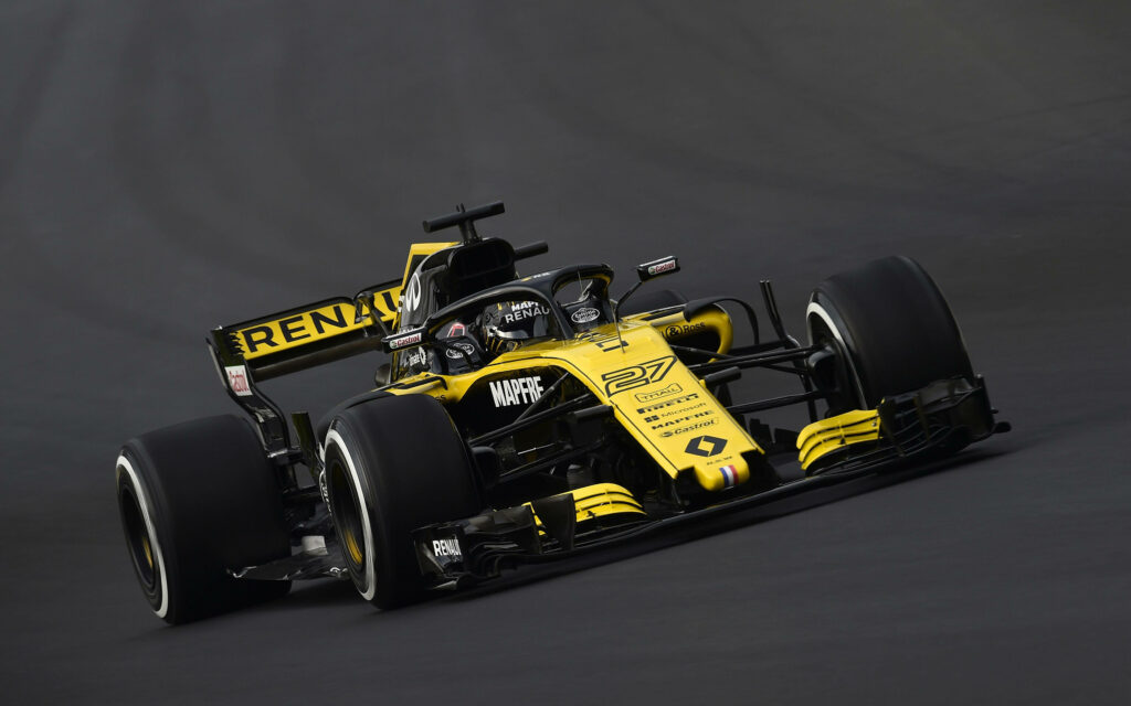 Vibrant Yellow and Black Renault F1 Car Wallpaper Background