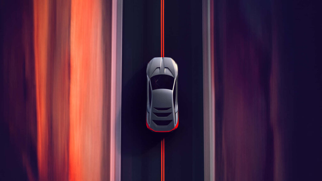 In Motion: Capturing the Dynamic Elegance of a Silver BMW M on Center Road Wallpaper