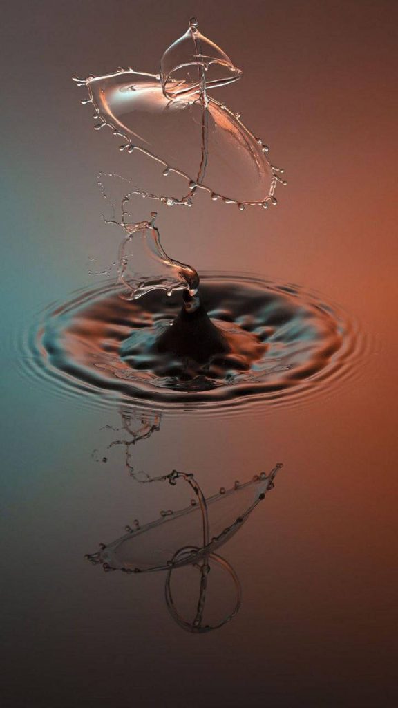 High-speed water drop collision umbrella splash on teal orange gradient wallpaper background