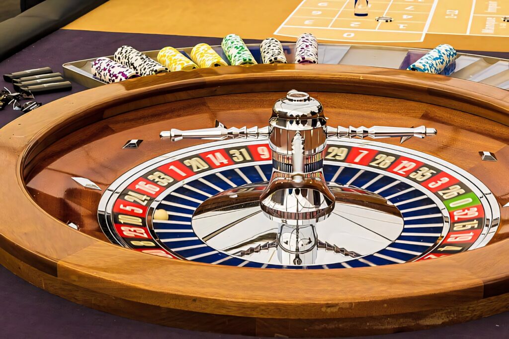 Thrilling casino roulette wheel with vibrant chips rich wood textures high stakes gaming wallpaper