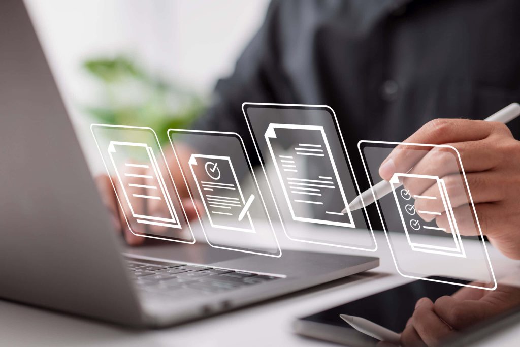 User interacting with holographic document and project management icons in modern workspace Wallpaper