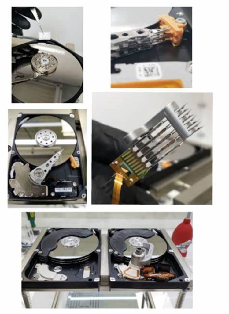 High-resolution collage of exposed hard drive disks showing magnetic platters read write heads and repair Wallpaper