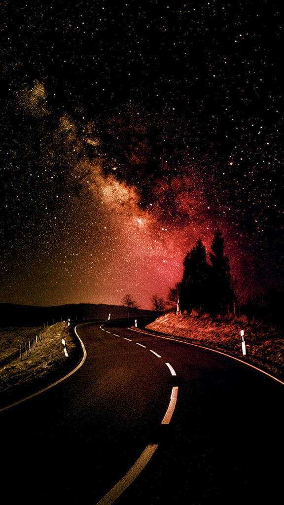 Stunning Night Sky over a Cosmic Highway: Captivating Galaxy iPhone Background Image Wallpaper