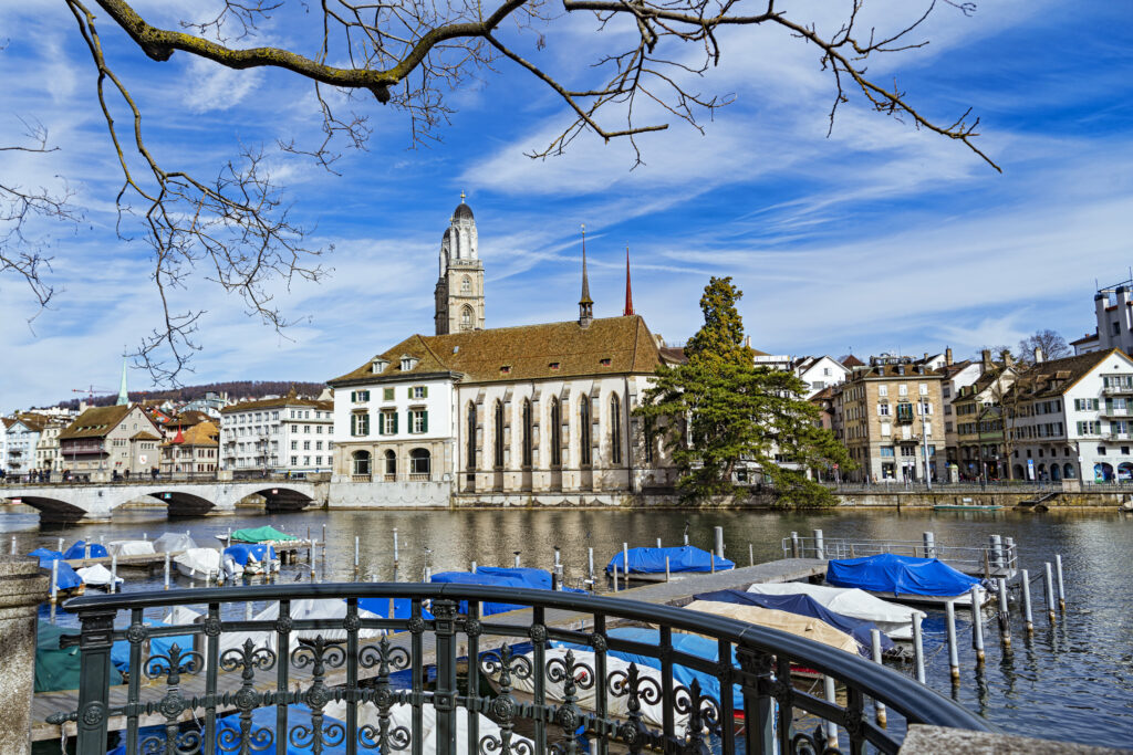 Scenic European Architecture Wallpaper with Waterfront & Boats