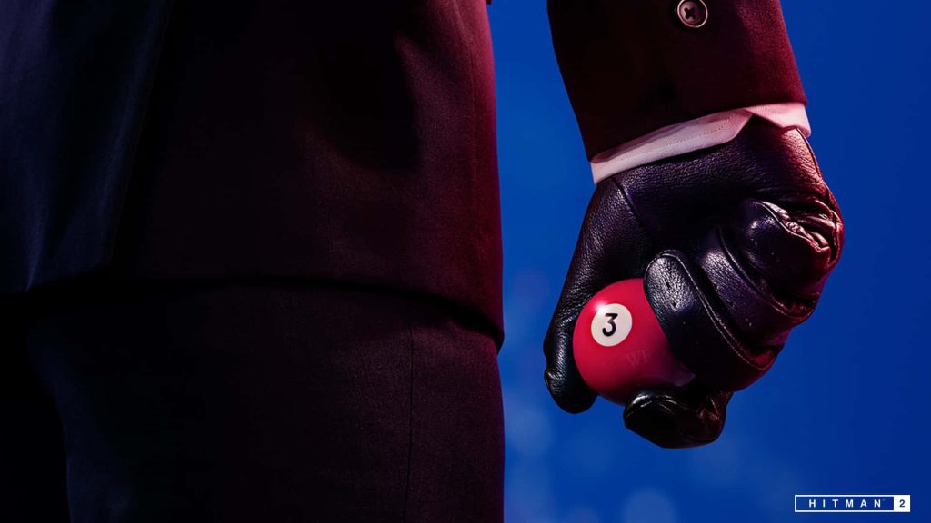 Hitman 2 Agent 47 in black suit holding red billiard ball 3 on vibrant blue background wallpaper