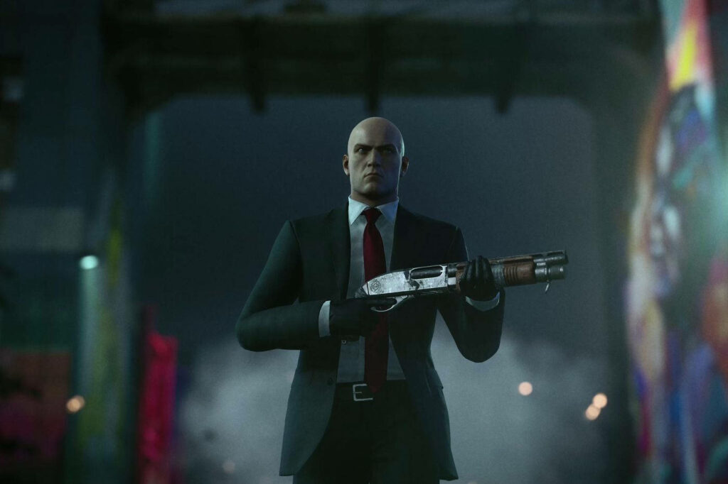 The Silent Shadow: Agent 47 Prepares to Strike in the Night Wallpaper