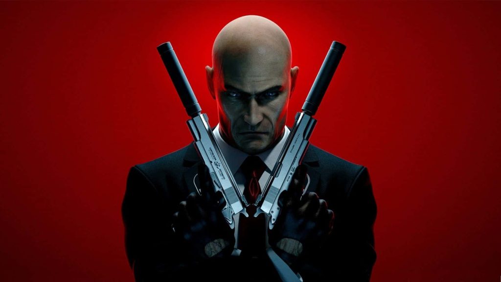 Hitman 3 Agent 47 in black suit and red tie with dual pistols on red background wallpaper