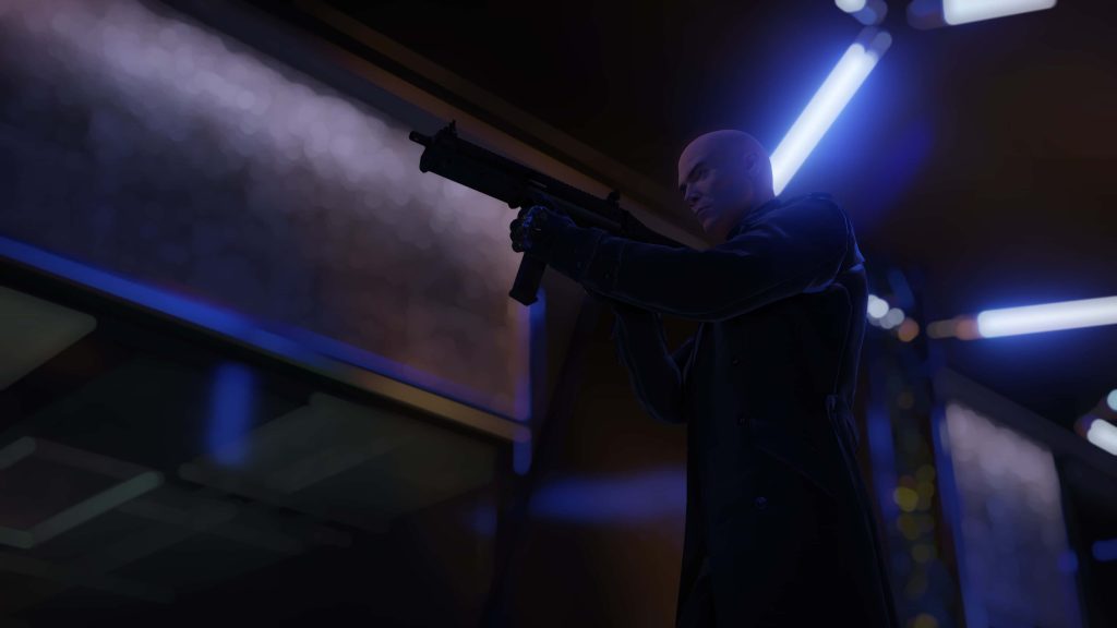 Hitman Agent 47 in stealth pose with submachine gun blue neon dark background CGI wallpaper