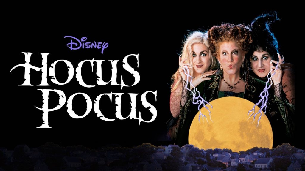 Hocus Pocus wallpaper with Sanderson sisters casting purple magic by full moon dark townscape