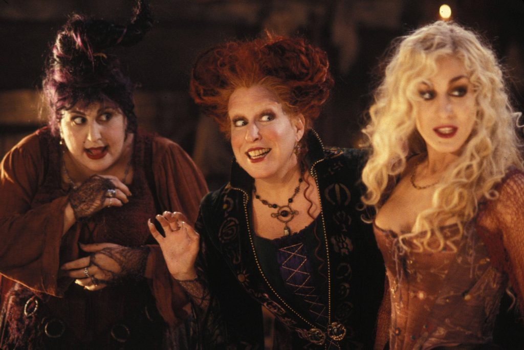 Hocus Pocus wallpaper featuring the iconic Sanderson Sisters in a spooky cinematic scene