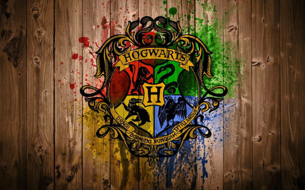 Iconic Hogwarts Crest Wallpaper: Four Houses on Rustic Wood