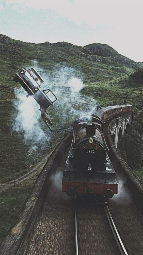 Magical Hogwarts Express Wallpaper with Flying Car & Scenic Viaduct