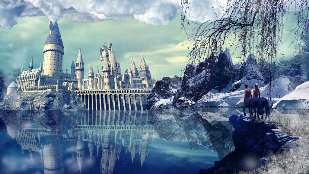 Hogwarts castle reflected in snowy lake with centaurs in foreground winter wizardry wallpaper