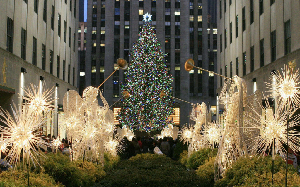 Holiday Wonderland: Rockefeller Center Walkway with Sparkling Lights Wallpaper