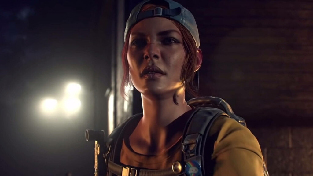Holly from Back 4 Blood poised for action with intense expression and signature gear wallpaper