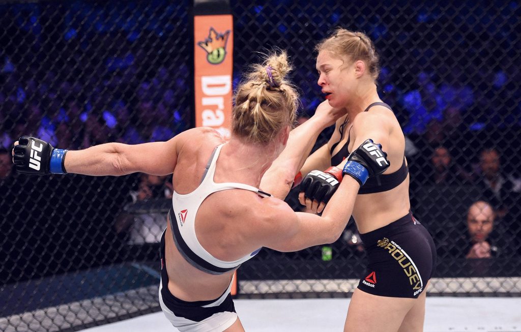 Holly Holm high kick knockout of Ronda Rousey UFC 193 action-packed MMA wallpaper background