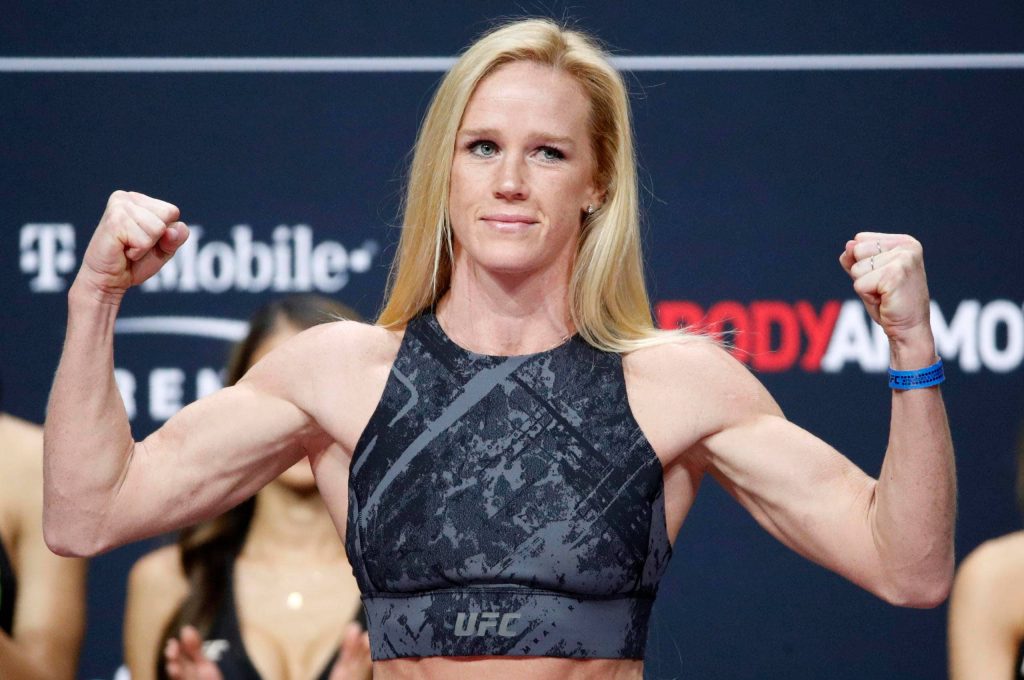 Holly Holm UFC weigh-in intense pose high resolution MMA champion athletic physique wallpaper