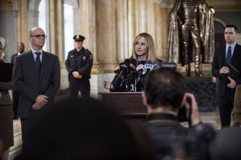 Holly Hunter as Senator June Finch speaking at a press conference in Batman v Superman film scene Wallpaper