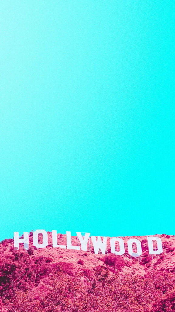 Vibrant Hollywood Sign Wallpaper: Neon Pink & Blue Gradient Sky
