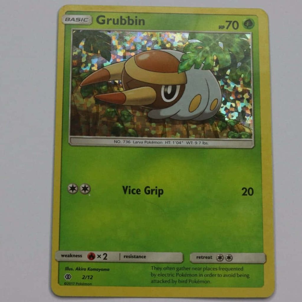 Holographic Grubbin Pokémon card 2017 by Akira Komayama with 70 HP and Vice Grip attack Wallpaper