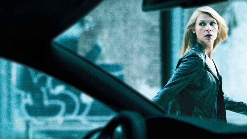 Claire Danes as Carrie Mathison in Homeland intense gaze inside vehicle blue-toned thriller wallpaper