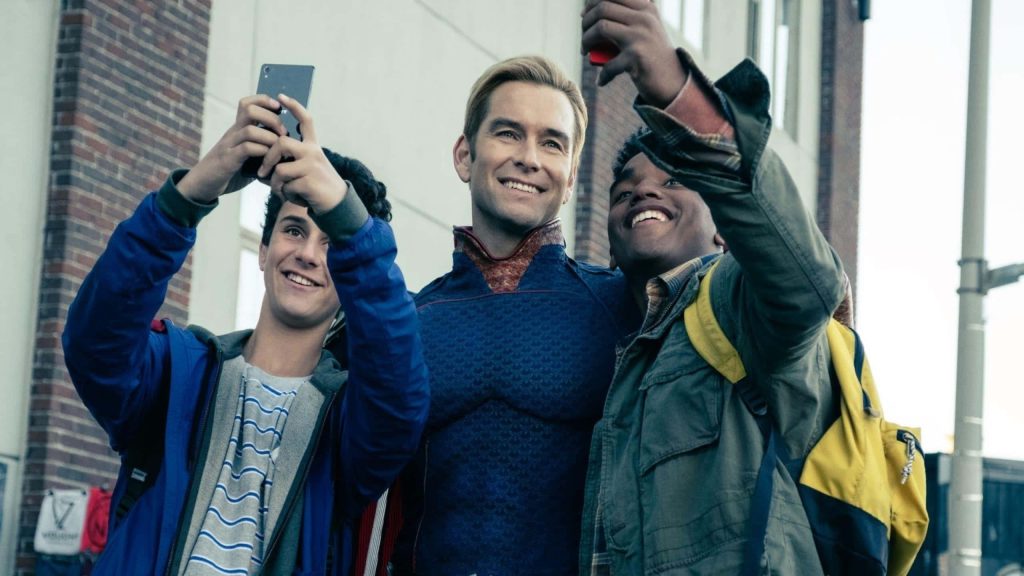Homelander selfie with fans outdoors Antony Starr as iconic Vought superhero wallpaper background