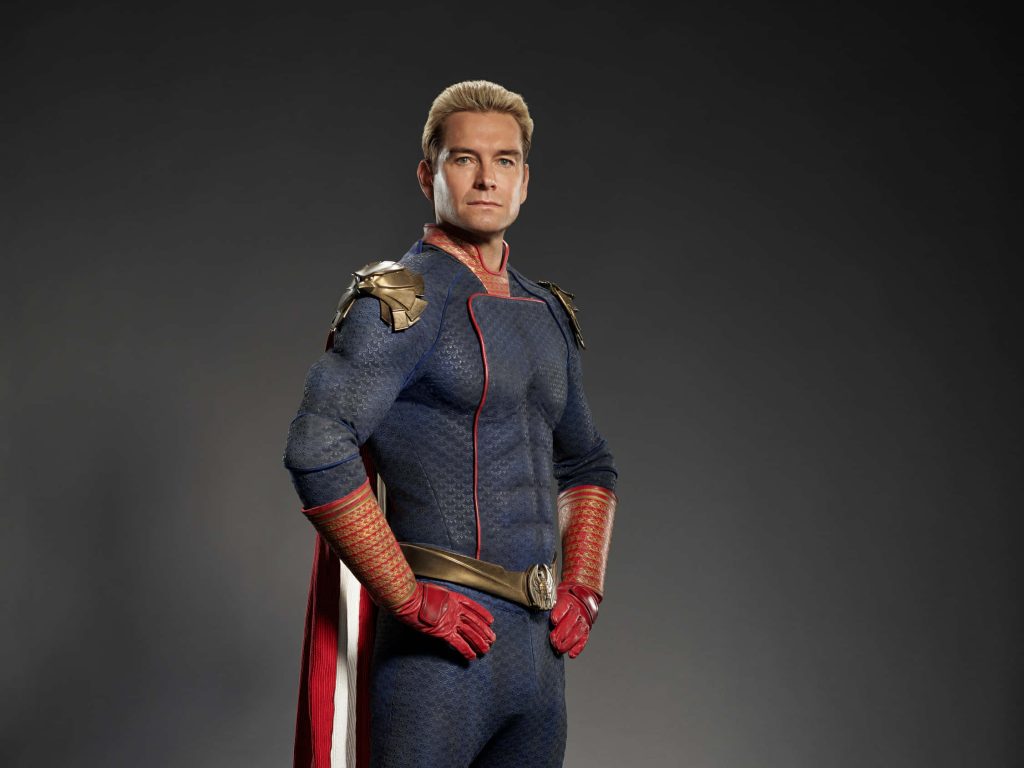 Homelander from The Boys in blue suit red cape intense pose dark background wallpaper