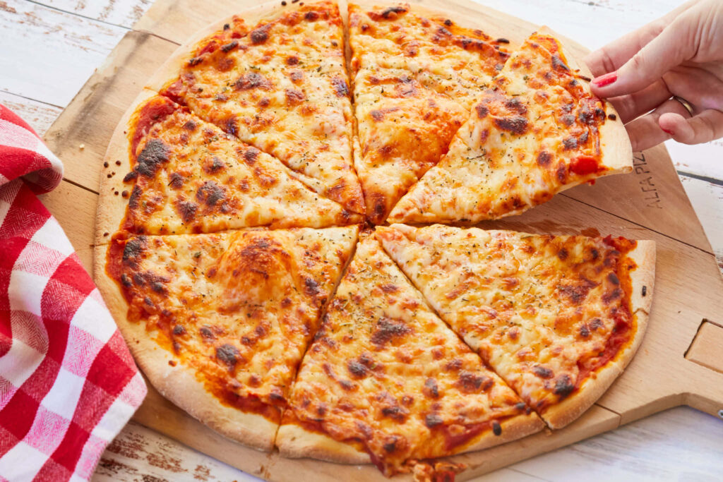 Delicious Homemade Pizza Wallpaper: Crispy Crust & Zesty Toppings