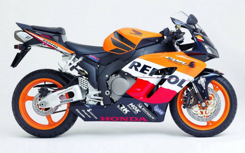 Honda CBR1000RR Fireblade Repsol sportbike side profile studio wallpaper vibrant colors