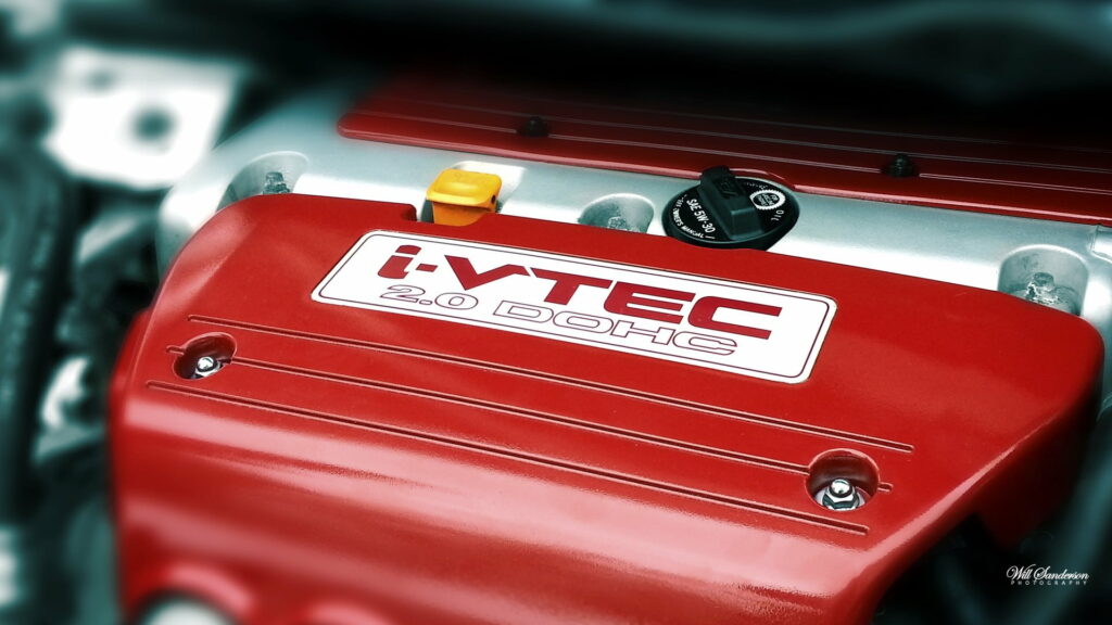 Revved Up Performance: Honda Civic Si Shines with its Powerful Engine - HD Wallpaper Background