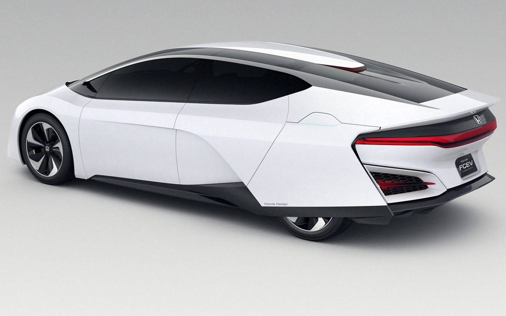 Honda FCEV Concept sleek white car with aerodynamic shape and red LED taillights in studio Wallpaper