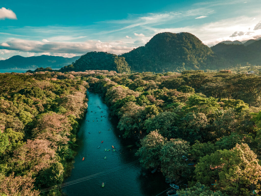 Honduras: Nature's Verdant Symphony Painted under Azure Skies Wallpaper