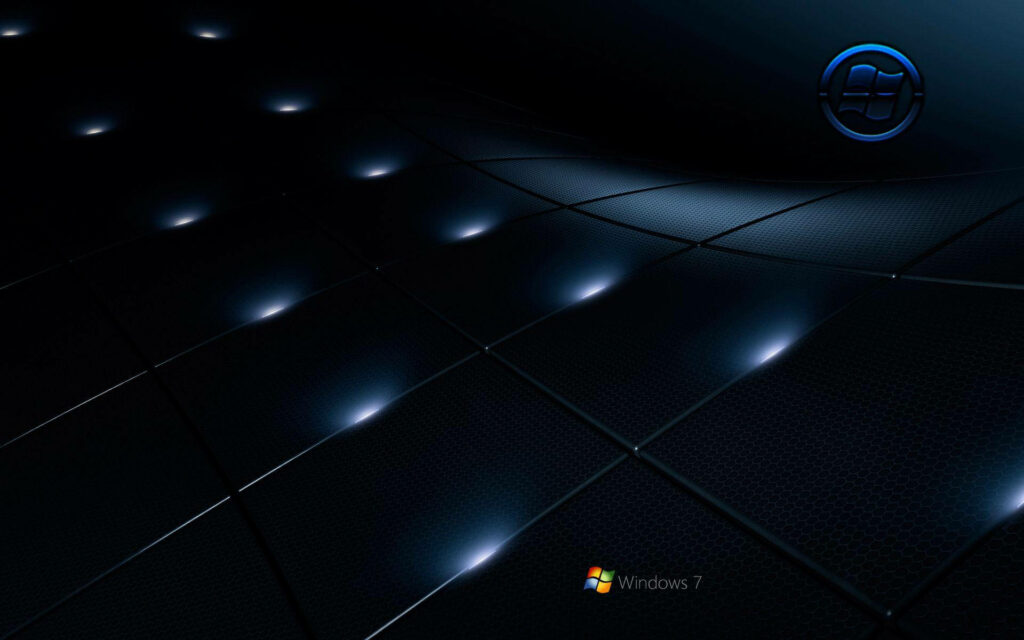 Honeycombed Elegance: Dark Windows 7 Logo Adorns a Stylishly Moody Wallpaper