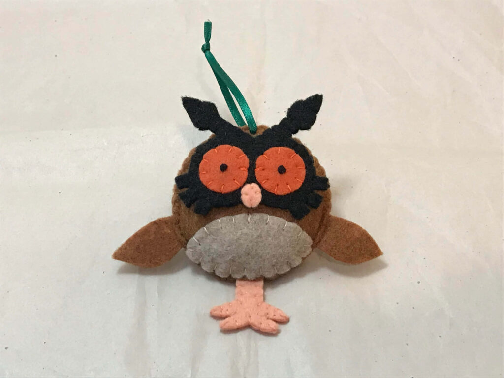 Hoothoot Plush Toy Wallpaper on Solid White Background
