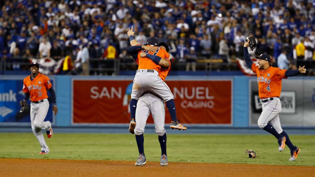 Houston Astros George Springer Marwin Gonzalez celebrate victory under stadium lights wallpaper