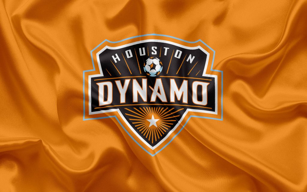 Houston Dynamo MLS team crest on vibrant silky orange crumpled flag wallpaper background