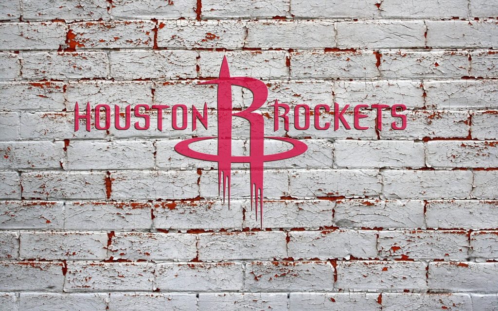 Houston Rockets wallpaper with red NBA logo on weathered white brick wall background