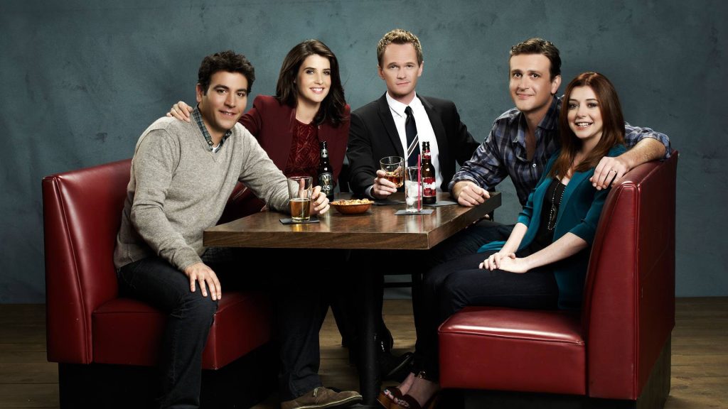 How I Met Your Mother cast relaxing in MacLarens Pub booth warm iconic wallpaper background