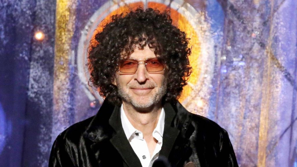 Howard Stern portrait with curly hair tinted glasses glowing halo blue purple abstract background Wallpaper
