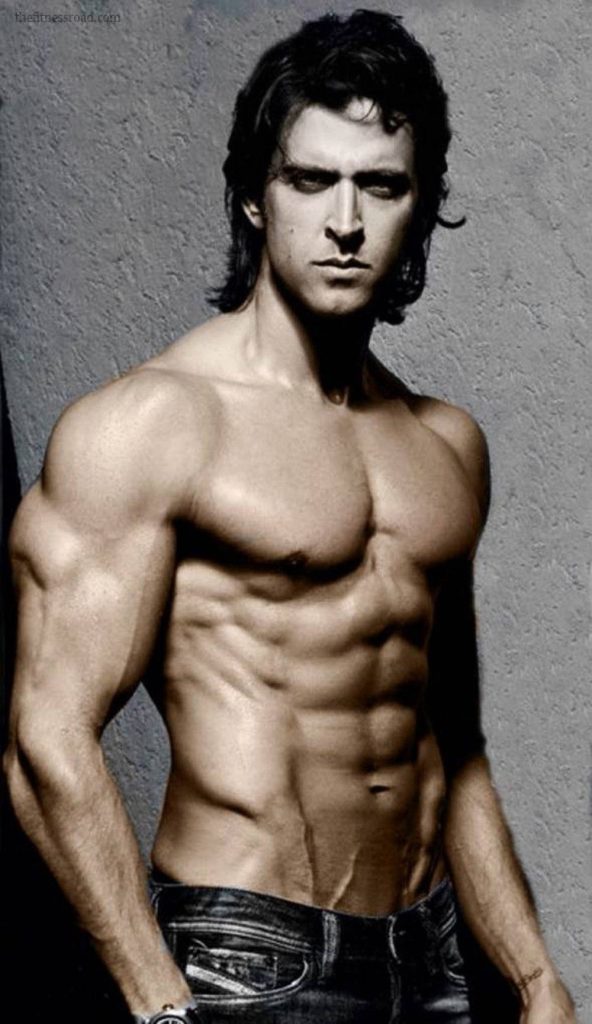 Gray aesthetic wallpaper of Bollywood star Hrithik Roshan with muscular physique and moody backdrop