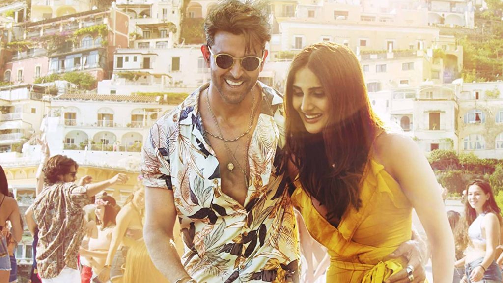 Hrithik Roshan and Vaani Kapoor smiling in stylish summer attire War Bollywood wallpaper background