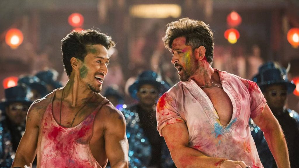 Hrithik Roshan and Tiger Shroff dancing in vibrant Holi colors from Bollywood movie War wallpaper