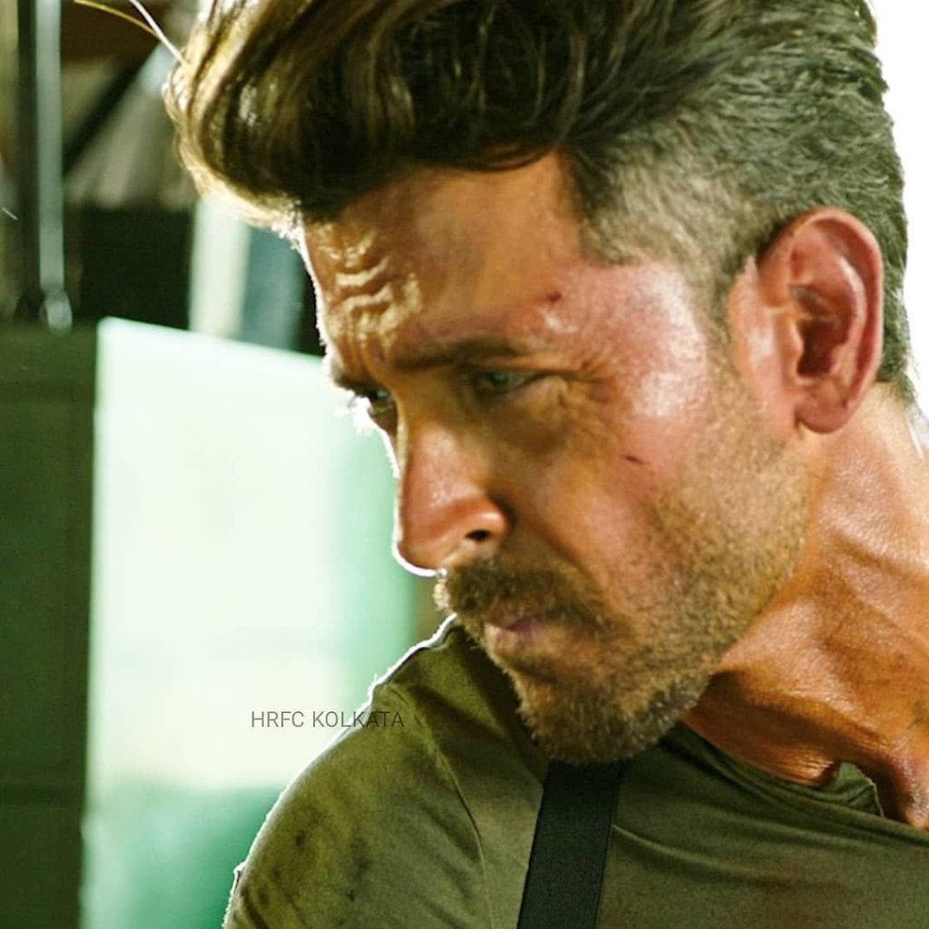 Hrithik Roshan as Major Kabir intense side profile with stubble and forehead scar War wallpaper